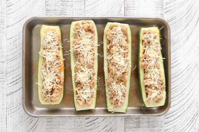 Step 4: Buffalo Chicken Zucchini Boats. Sprinkle the zucchini with mozzarella cheese and bake.