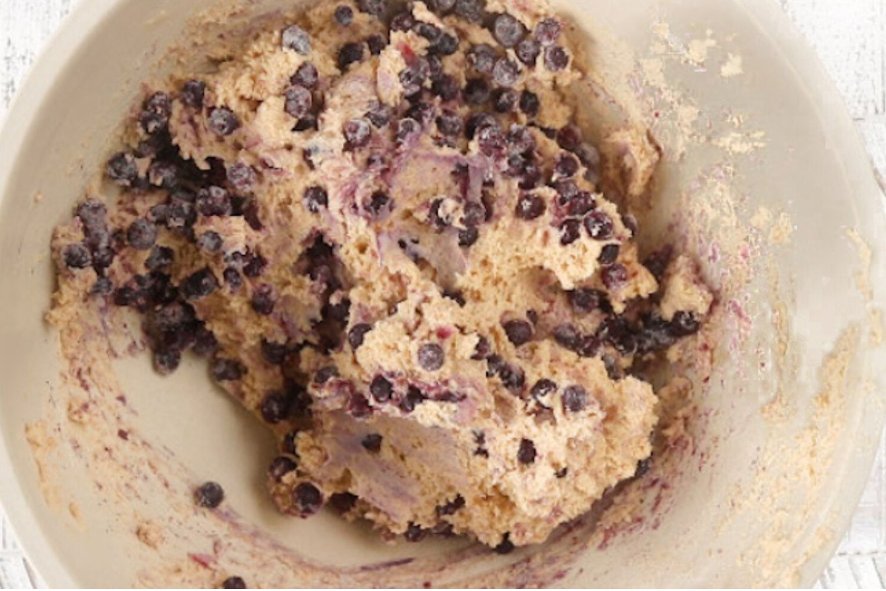 Step 4 - Blueberry Protein Muffins. Mix the wet and dry ingredients to make muffin batter.