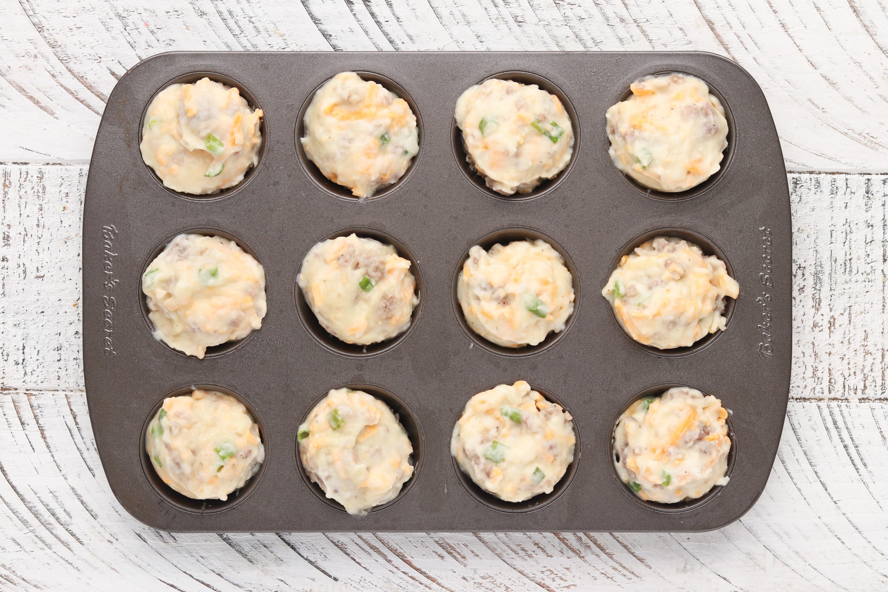Step 3 - Leftover mashed potato puffs in a mini muffin pan. 