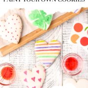 Paint your own cookies and The Cookie Countess paint palettes on a white table.