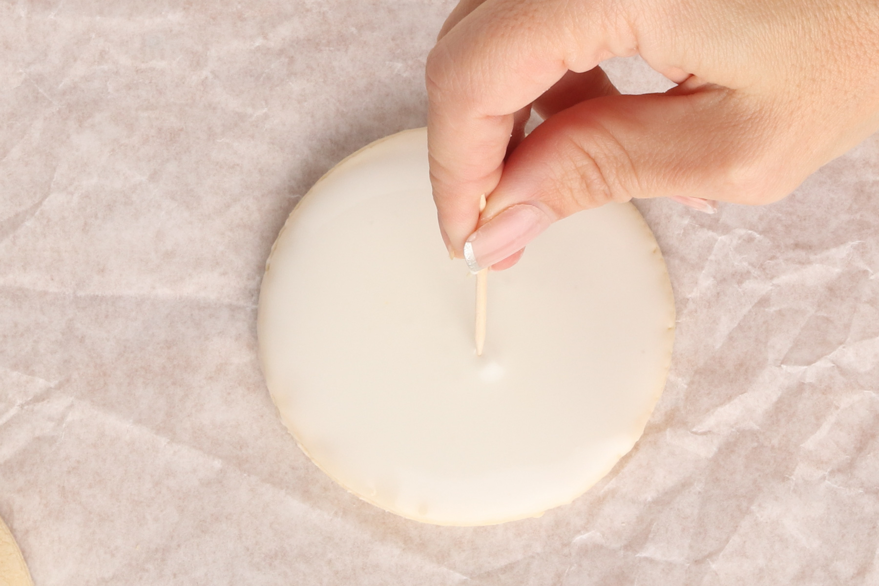 Step 5: Paint Your Own Cookies. Use a toothpick to pop any bubbles.