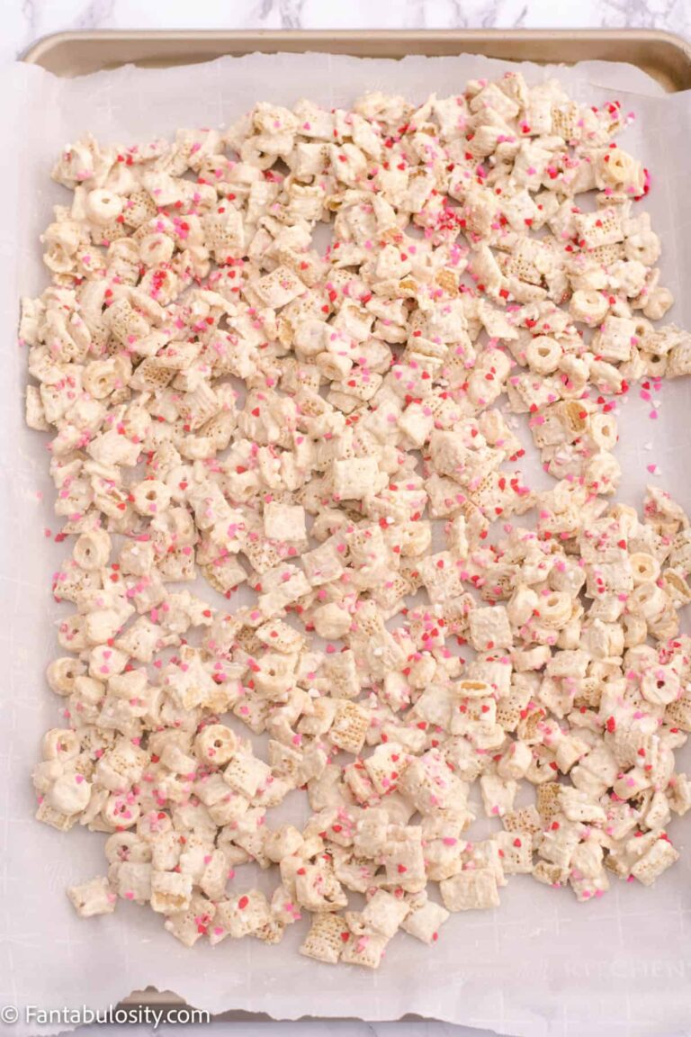 Valentine Snack mix for classroom party. Popcorn and cereal tossed in melted white chocolate.