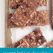 Peanut Butter Chocolate Protein Bars on a wood board.