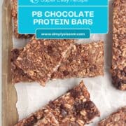 Peanut Butter Chocolate Protein Bars on a wood board.