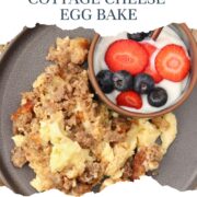 Cottage Cheese Egg Bake on a gray plate with a yogurt parfait.
