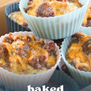 Pinterest graphic for freezer baked egg muffins with a close-up photo of sausage and cheese egg muffins.