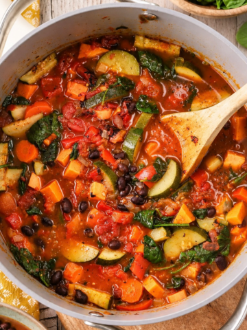 This thick and chunky vegetable soup is packed with big, hearty pieces of sweet potato, carrots, zucchini, and black beans in a flavorful tomato broth. A homemade soup spice blend makes this easy one-pot recipe especially good, and the leftovers are perfect for lunch.